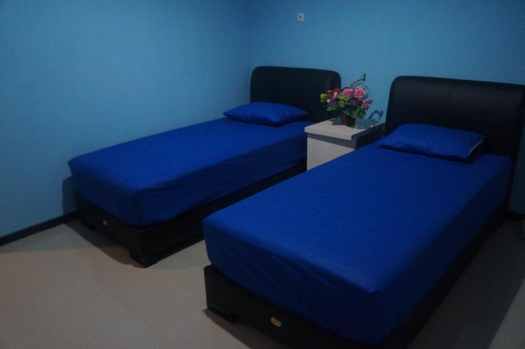 Budget Guest House Tunas Mandiri Jaya Malang Phòng bức ảnh